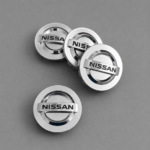Set of 4 Nissan Silver 54mm Wheel Center Cap Fits Altima Maxima Murano Rogue