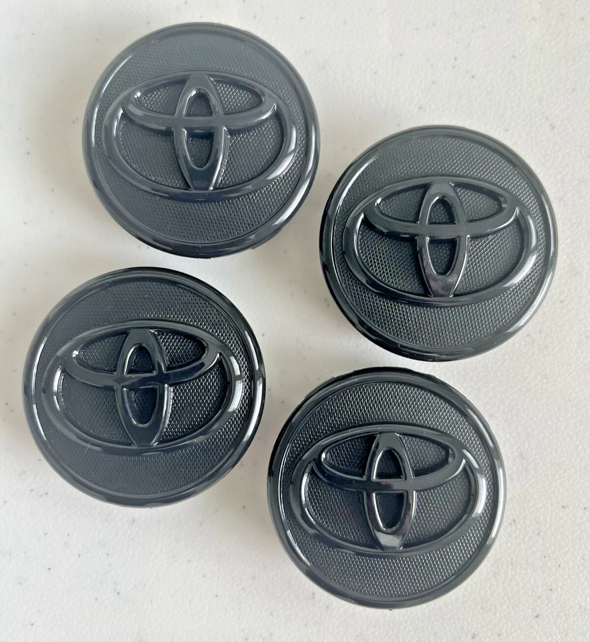 4 Toyota 57mm Matte Black Logo Wheel Center Caps Fits Corolla Prius & Yaris 4 Toyota 57mm Matte Black Logo Wheel Center Caps Fits Corolla Prius & Yaris - Image 1